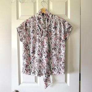 LOFT Floral sleeveless blouse with tie collar